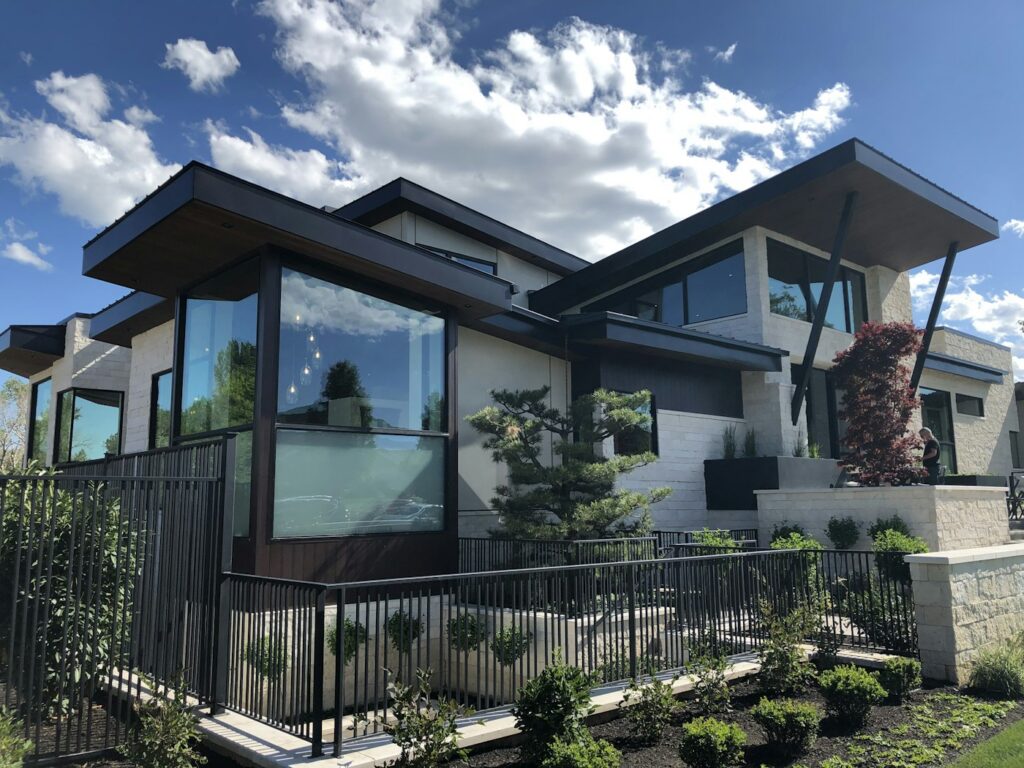 Modern home with large windows illustrating residential window film planning